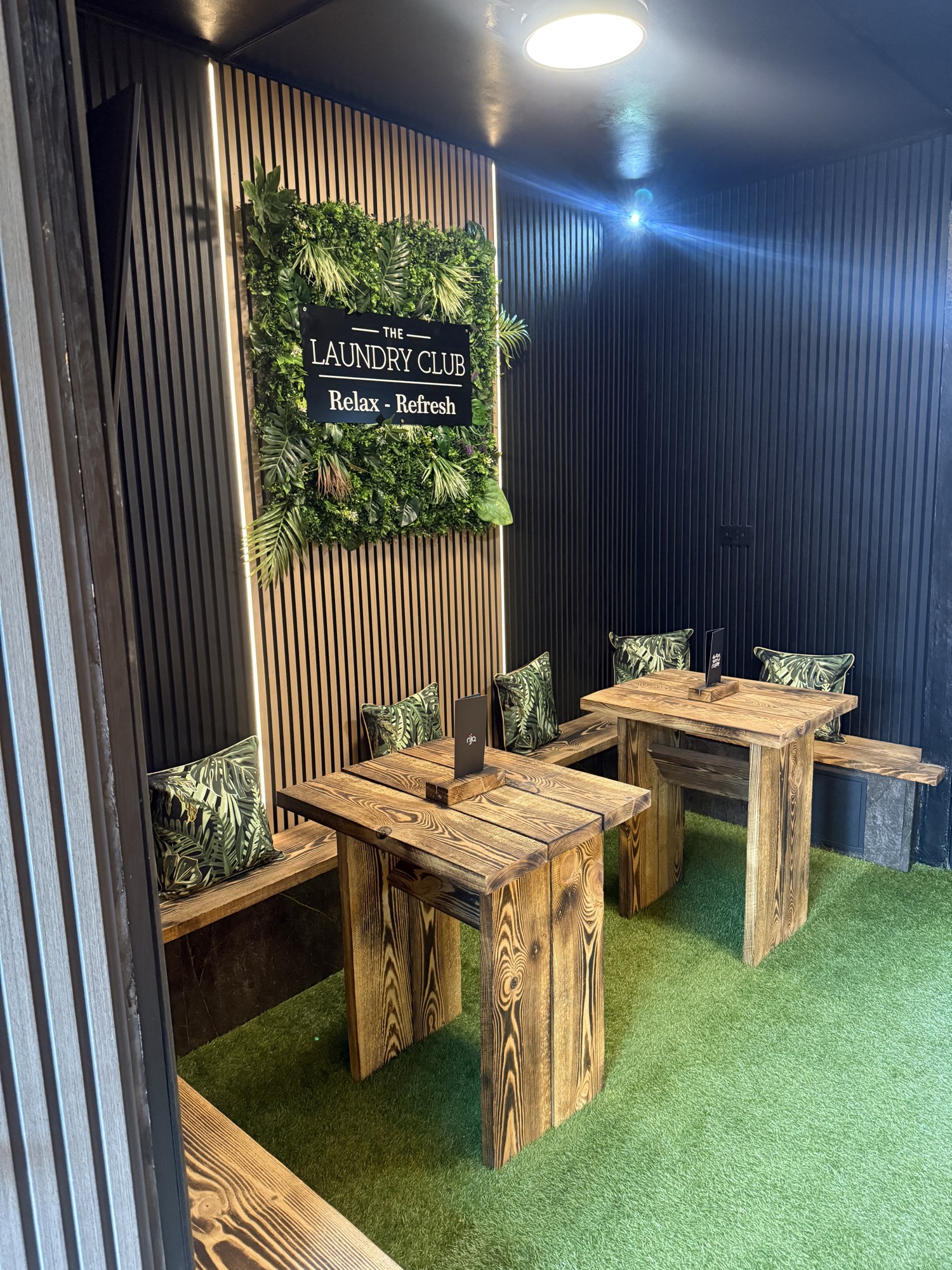 The Laundry Club seating area — Relax and Refresh